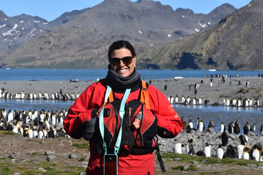 Diania Pimenta in South Georgia with penguins