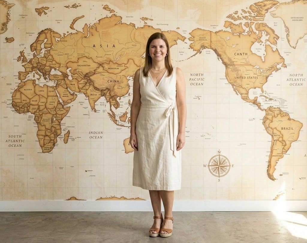 Diania Pimenta, ASTA Verified luxury and expedition travel advisor and founder of Abora Travel, standing in front of a world map in Tampa, Florida. Diania Pimenta, ASTA Verified luxury and expedition travel advisor and founder of Abora Travel, standing in front of a world map in Tampa, Florida.
